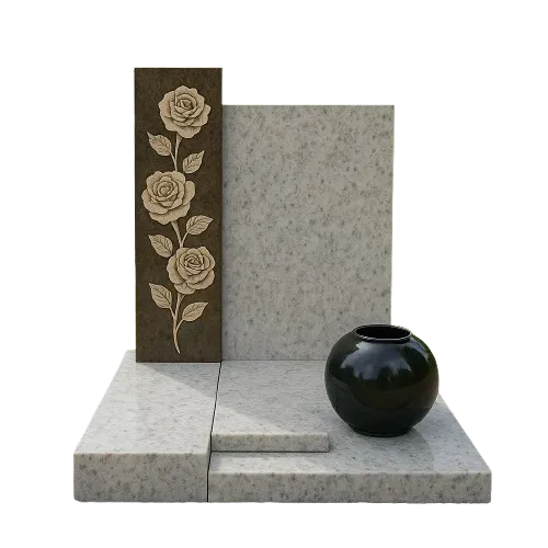 Monument funéraire moderne en granit gris avec stèle gravée de roses.